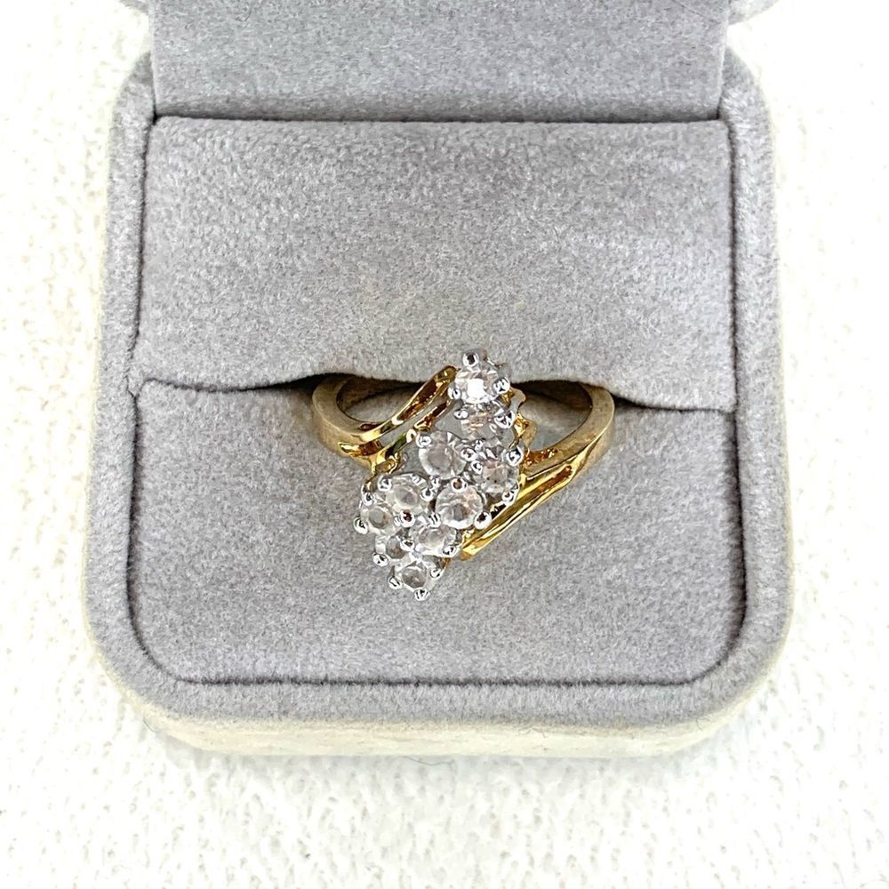 Gold band with clear stone ring